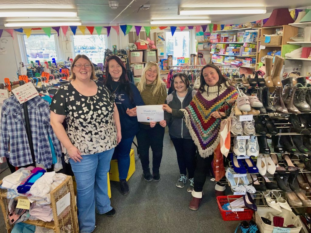5 women/volunteers in swapshop