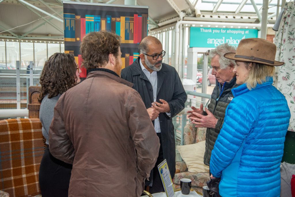 Mohammed Saddiq, Lord-Lieutenant of Somerset and Justin Sargent chatting with some people at The Hub in Bridgwater. Photo credit: Brian Bateman.
