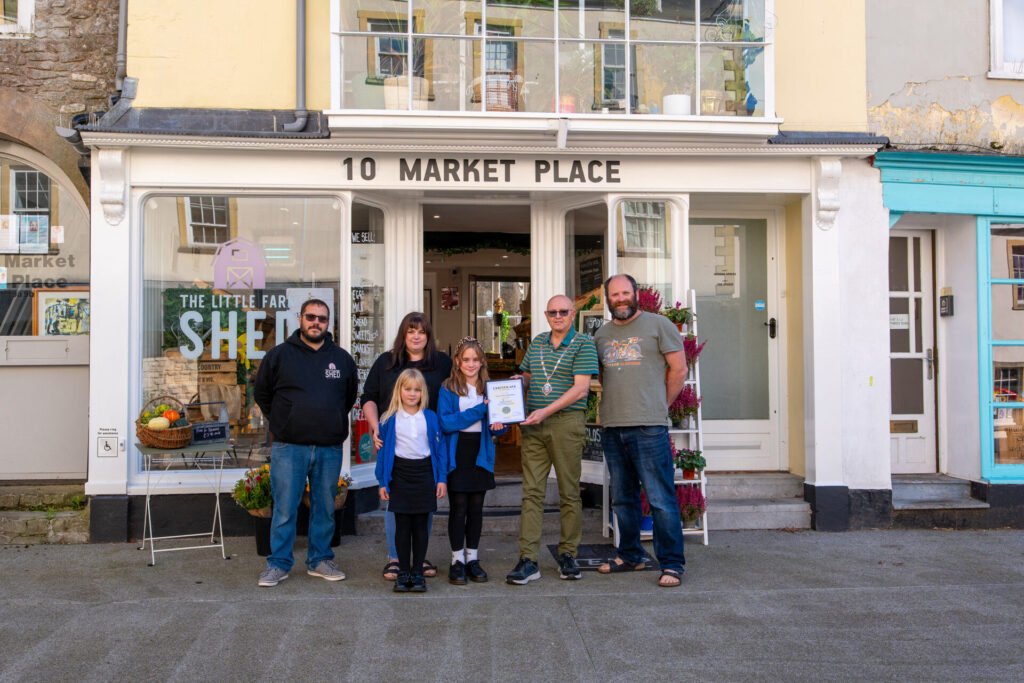 Little Farm Shed owners standing outside 10 Market Place in Shepton Malley